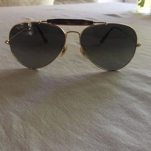 Ray-Ban aviator sunglasses.